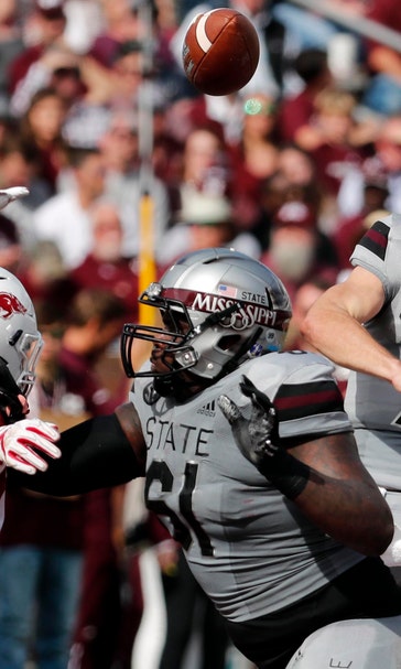Fitzgerald leads No. 25 Mississippi St past Arkansas 52-6